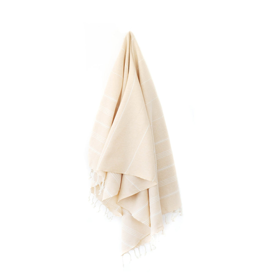 Organic Turkish Cove mustard towel hanging