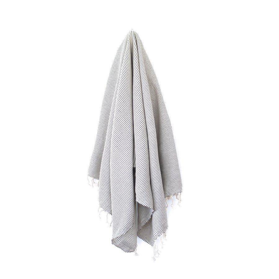 Organic Turkish Kai black towel hanging