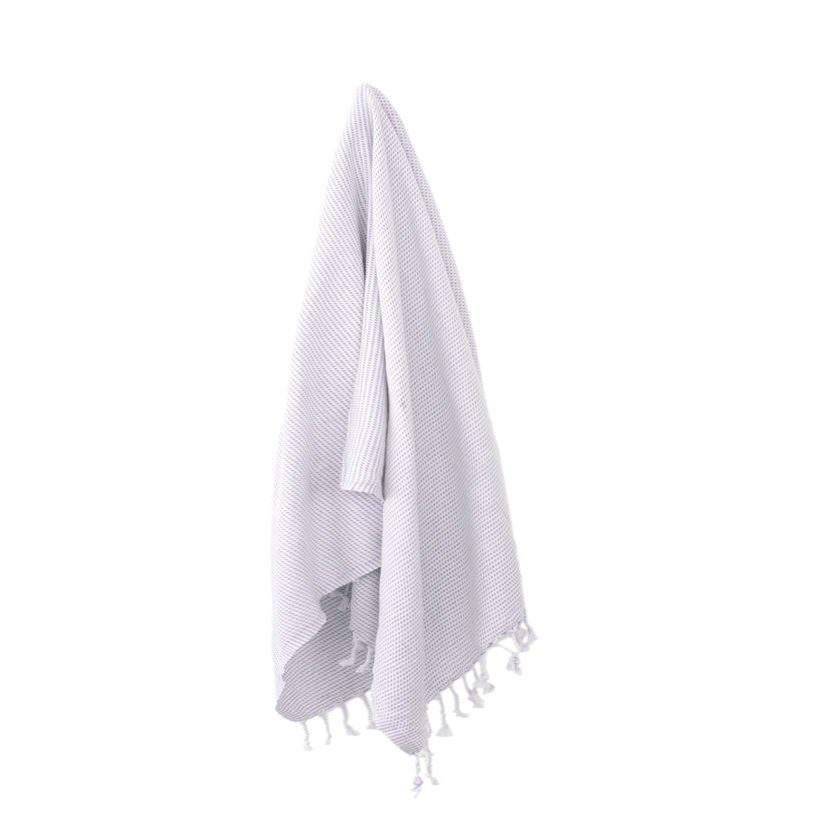 Organic Turkish Kai lilac towel hanging