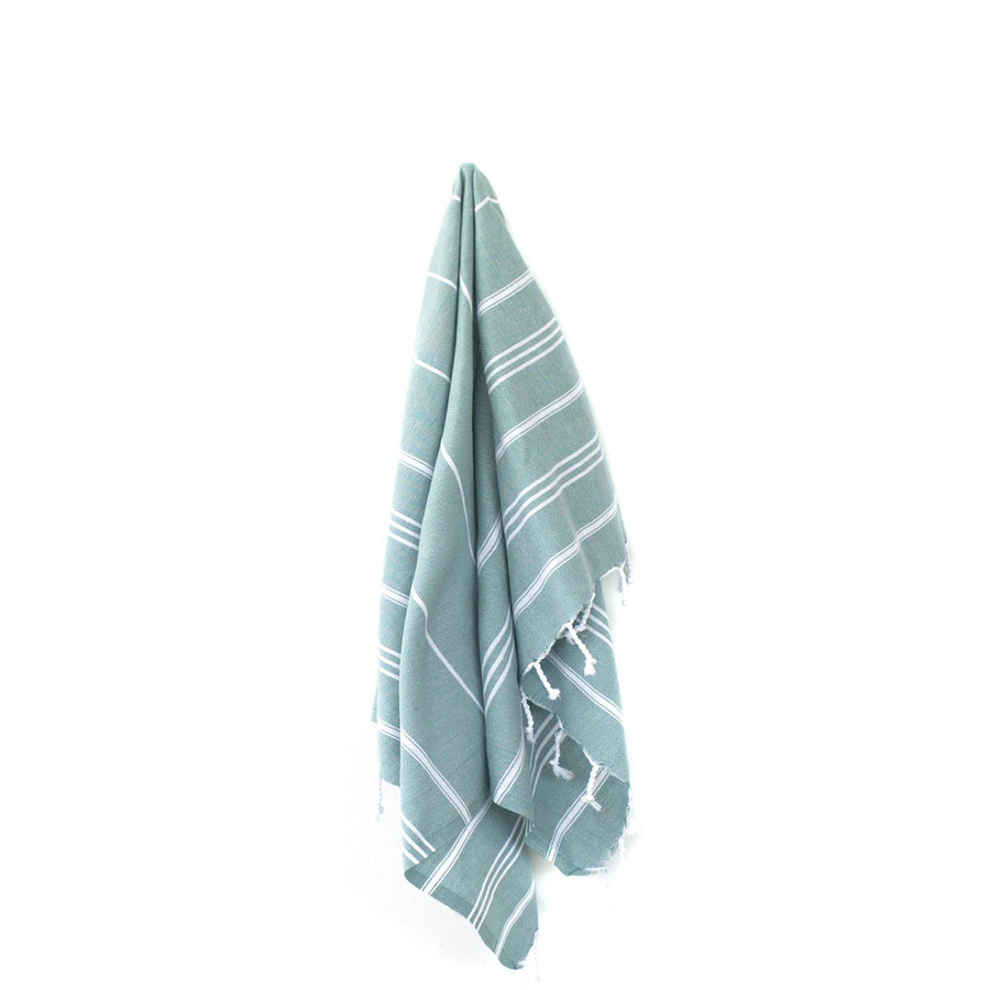 https://www.strayandwander.com/cdn/shop/products/Marin-Green-Turkish-towel-hanging_900x.jpg?v=1619980576