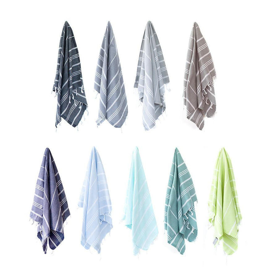 https://www.strayandwander.com/cdn/shop/products/Marin-Turkish-towel-stacked_900x.jpg?v=1619980420