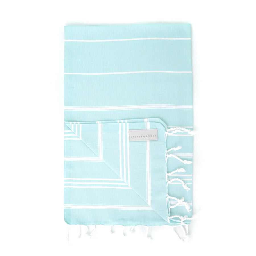 https://www.strayandwander.com/cdn/shop/products/Marin-Turquoise-Turkish-towel-folded_900x.jpg?v=1619980759