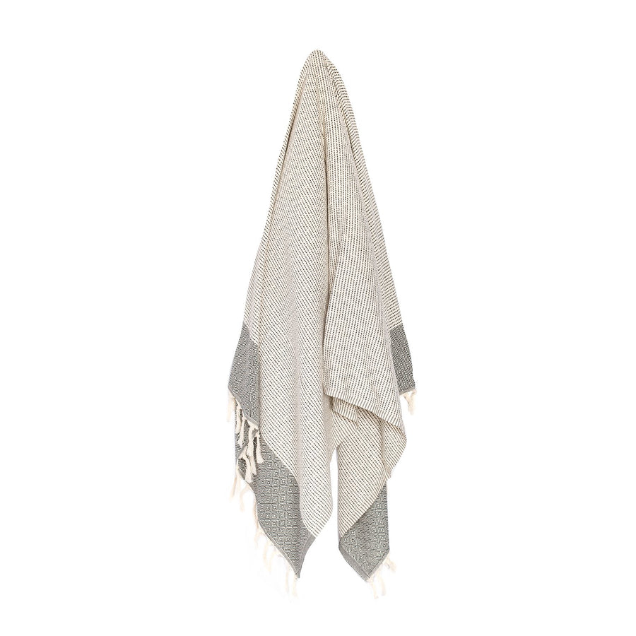 Organic Turkish Repose black towel hanging