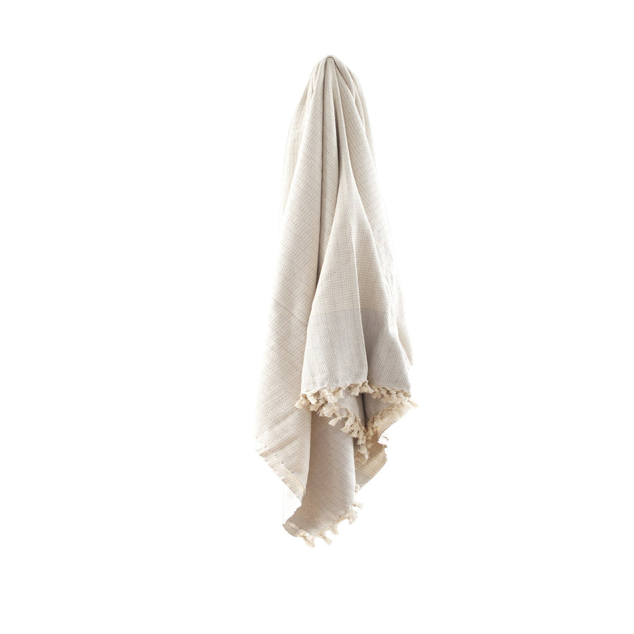 Taupe organic Turkish Repose blanket hanging